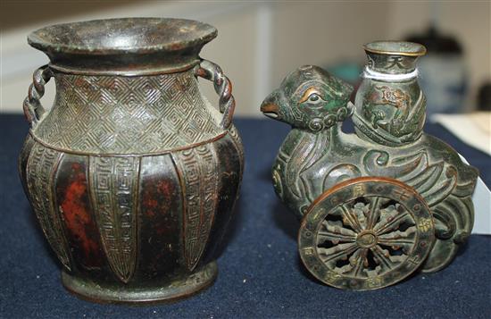 A Chinese small bronze phoenix vase and an archaistic bronze vase, 17th / 18th century, 8.8 and 9.5cm (2)